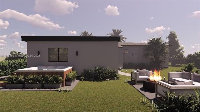 rear view of property featuring a hot tub, stucco siding, an outdoor fire pit, and a yard