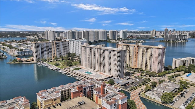 aerial view featuring a water view and a city view