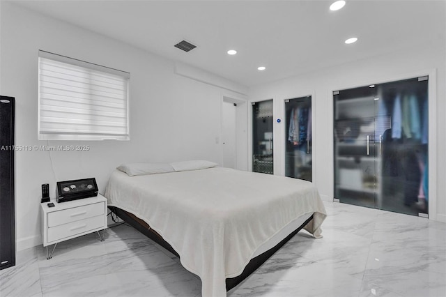 bedroom with marble finish floor, visible vents, and recessed lighting