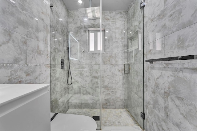 full bathroom with a shower stall