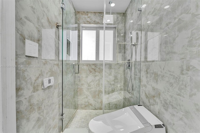 full bath with a shower stall