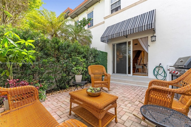 view of patio / terrace featuring a grill