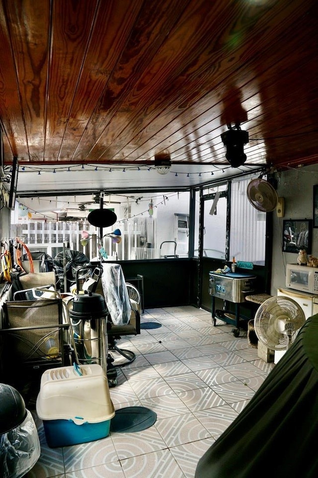 interior space featuring wooden ceiling