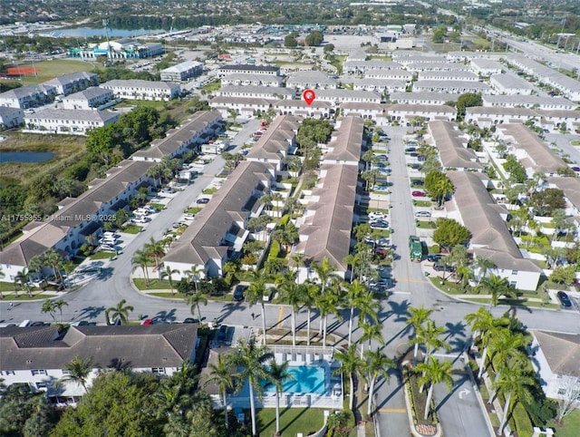 aerial view with a water view and a residential view