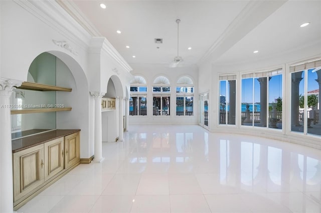 interior space with visible vents, crown molding, baseboards, light tile patterned floors, and recessed lighting