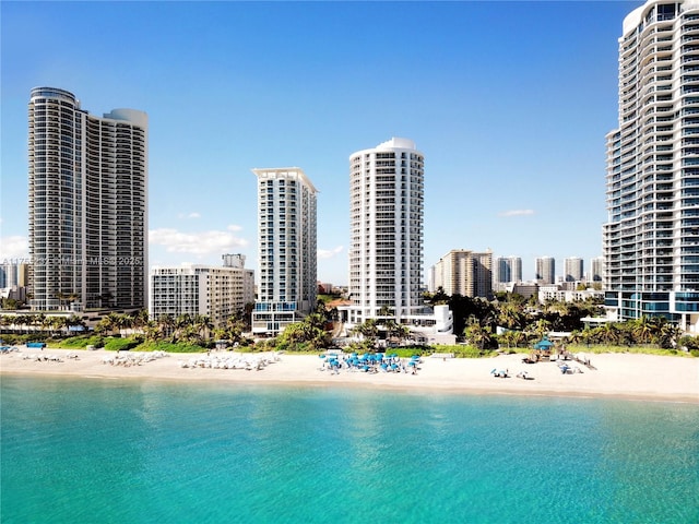 water view with a beach view and a city view