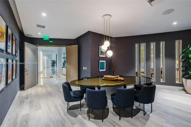 dining room featuring light wood-type flooring, visible vents, and recessed lighting