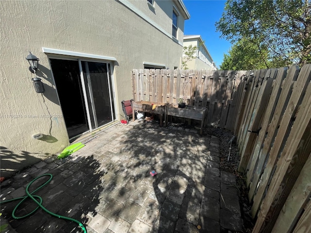 view of patio / terrace with fence