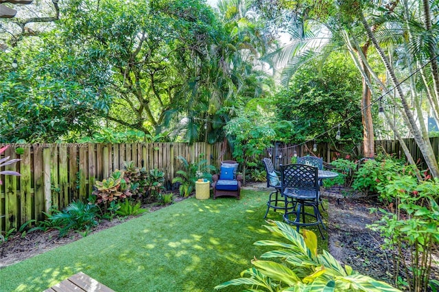 view of yard with a fenced backyard