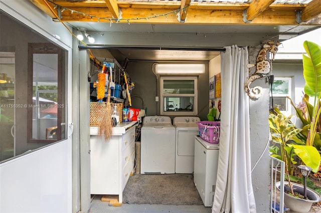 laundry area featuring laundry area and washing machine and dryer