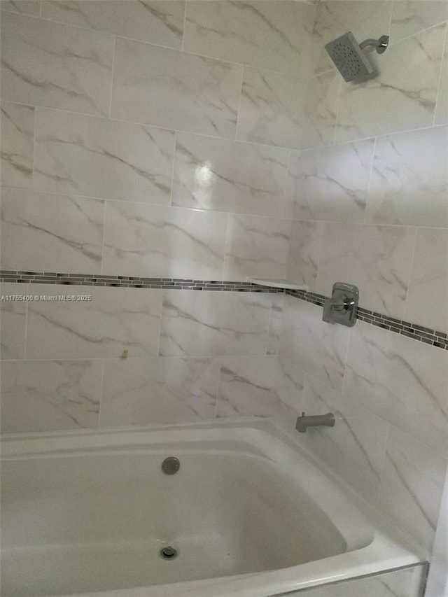 bathroom featuring shower / tub combination