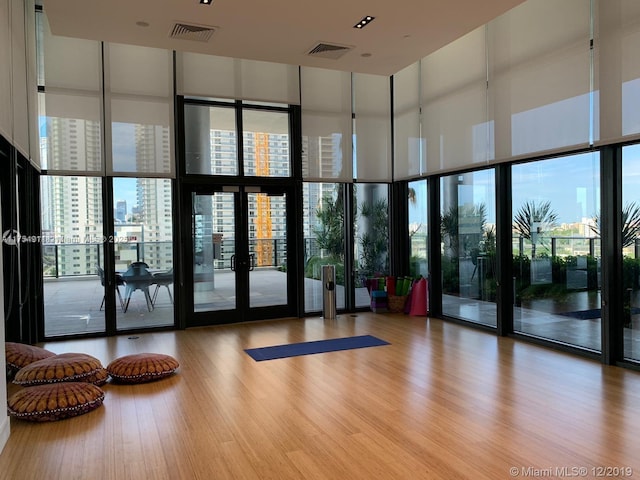 lobby featuring visible vents and a city view