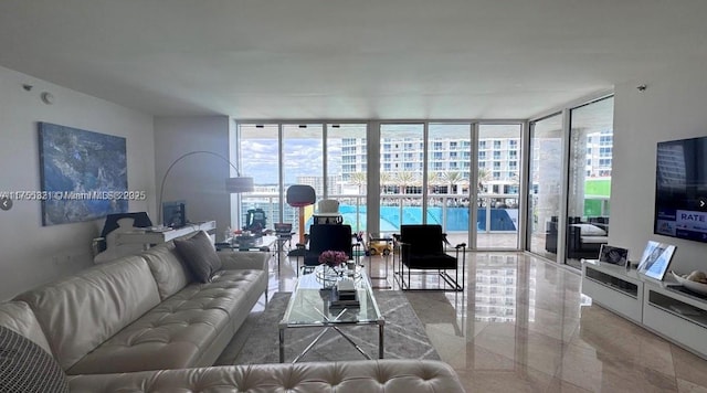 1800 S Ocean Dr Unit 1510, Hallandale Beach, FL 33009 - living area featuring a wall of windows and plenty of natural light