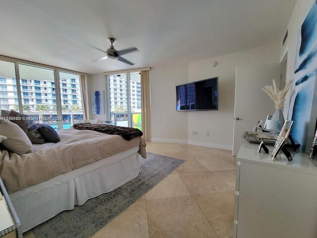 1800 S Ocean Dr Unit 1510, Hallandale Beach, FL 33009 - bedroom with light tile patterned floors, baseboards, and a ceiling fan