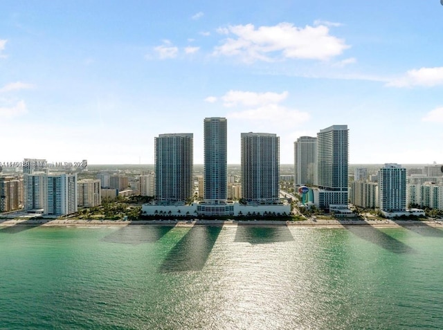 exterior space with a view of city and a water view