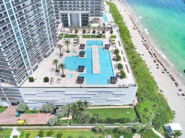 drone / aerial view with a view of the beach and a water view