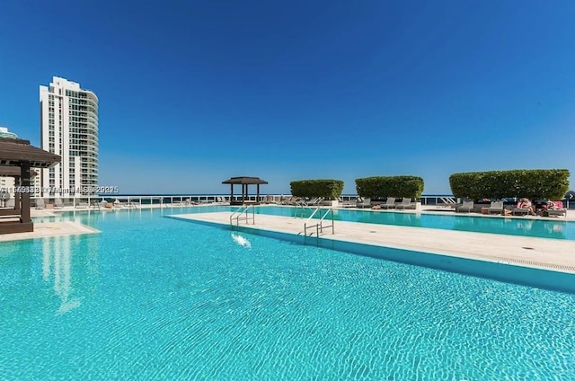 pool with a patio