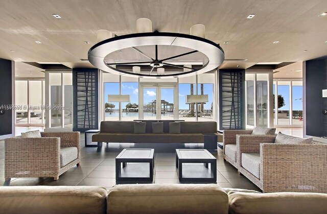 1800 S Ocean Dr Unit 1510, Hallandale Beach, FL 33009 - lobby with a wall of windows, a water view, wood ceiling, and recessed lighting