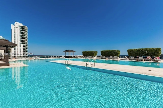 1800 S Ocean Dr Unit 1510, Hallandale Beach, FL 33009 - community pool with a patio