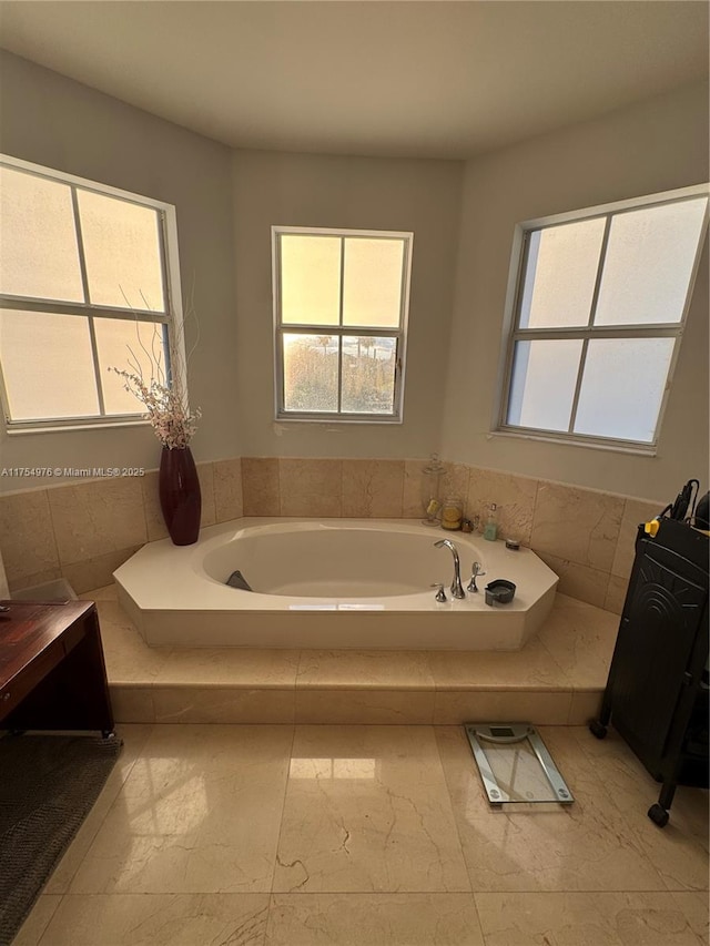 full bath with a garden tub