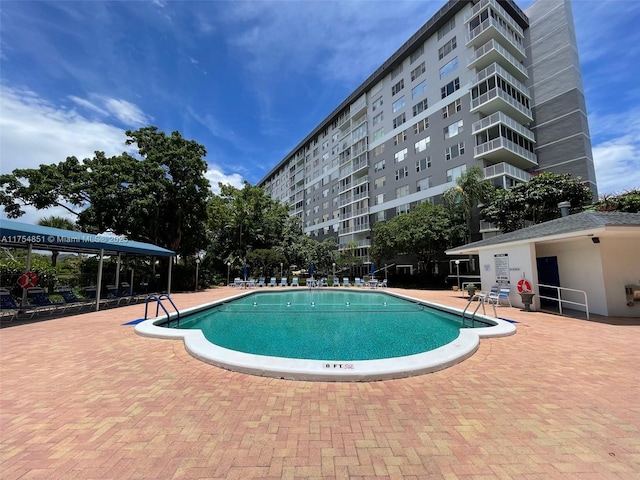 pool with a patio