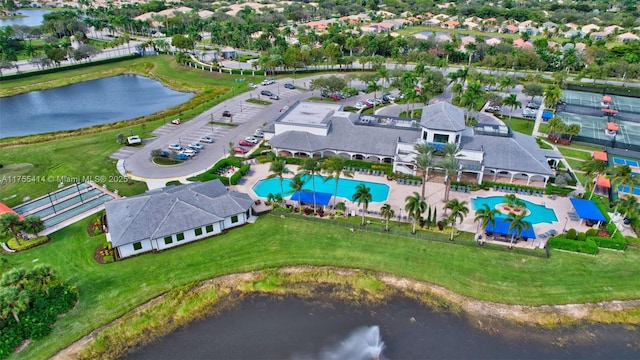 aerial view featuring a water view and a residential view