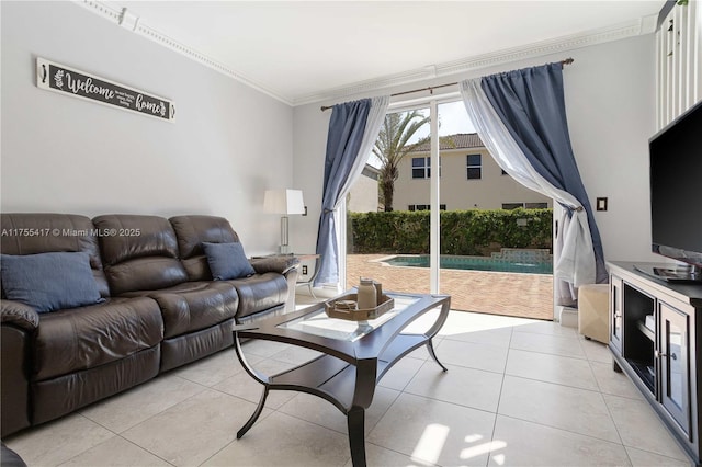 living area with light tile patterned floors and crown molding