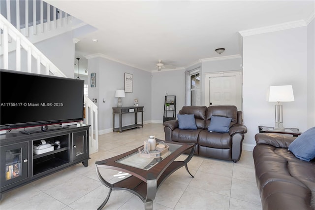 living area featuring light tile patterned floors, ceiling fan, and ornamental molding