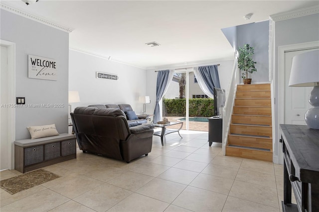 living area featuring light tile patterned floors, visible vents, stairs, and ornamental molding