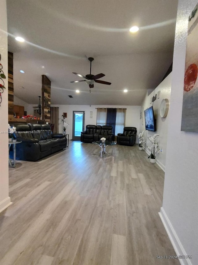 living room with recessed lighting, baseboards, a ceiling fan, and wood finished floors
