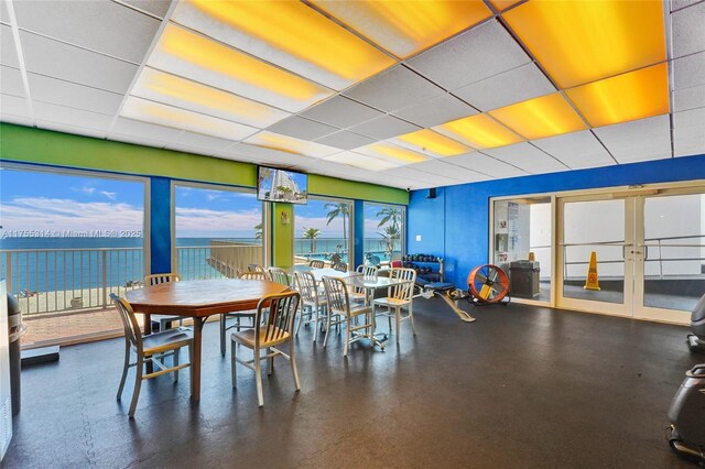 3111 N Ocean Dr Unit 508, Hollywood, FL 33019 - dining area featuring a drop ceiling