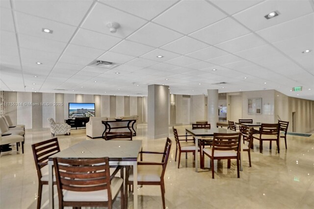 3111 N Ocean Dr Unit 508, Hollywood, FL 33019 - dining space featuring a drop ceiling