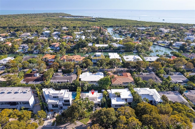 birds eye view of property featuring a residential view and a water view