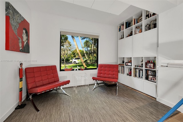 sitting room featuring baseboards