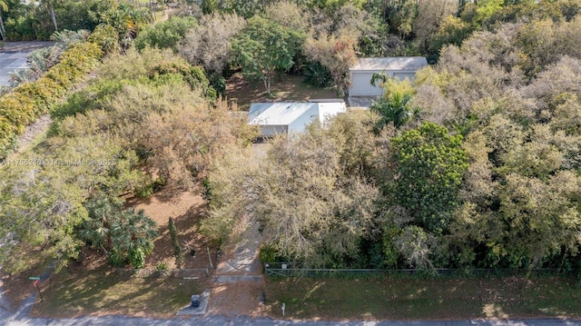 aerial view featuring a view of trees