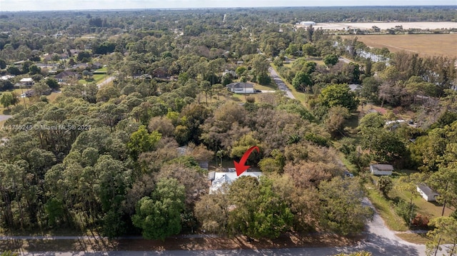 aerial view featuring a forest view