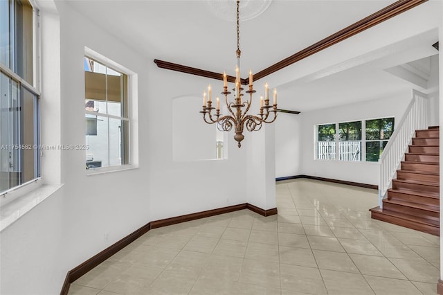 tiled empty room with a chandelier, crown molding, stairway, and baseboards