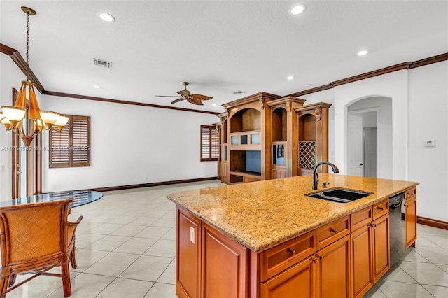 kitchen with black dishwasher, light tile patterned floors, a sink, and a center island with sink