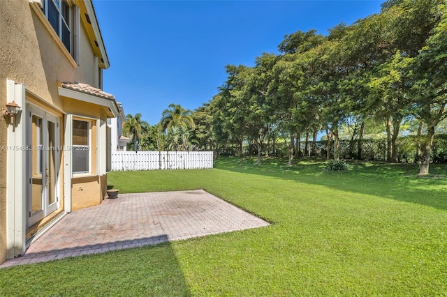 view of yard featuring a patio area and fence