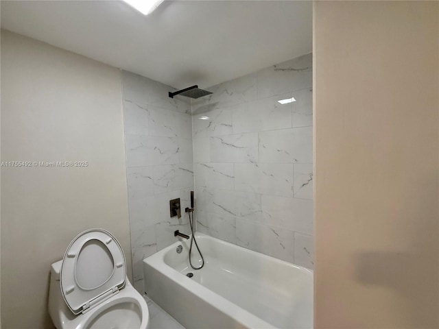 bathroom with toilet and washtub / shower combination