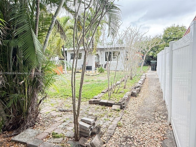 view of yard with fence