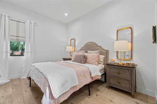 bedroom featuring recessed lighting, light wood-style flooring, and baseboards