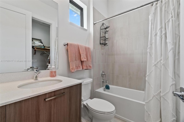 full bath featuring vanity, toilet, and shower / tub combo with curtain