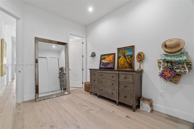 bedroom featuring recessed lighting, light wood-type flooring, and baseboards