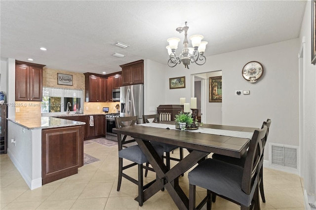 dining room featuring recessed lighting, visible vents, a notable chandelier, and light tile patterned flooring