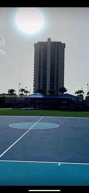 view of basketball court with community basketball court