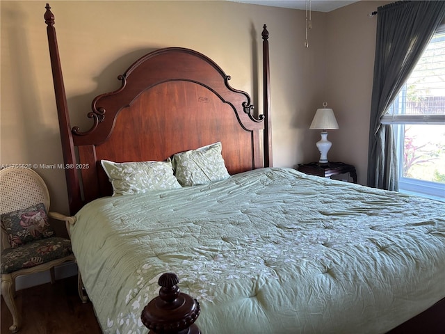 bedroom with multiple windows