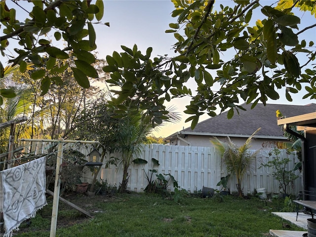 view of yard featuring a fenced backyard