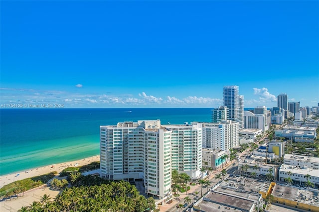 bird's eye view featuring a water view and a view of city