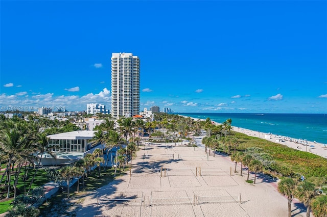 view of water feature with a city view and a view of the beach